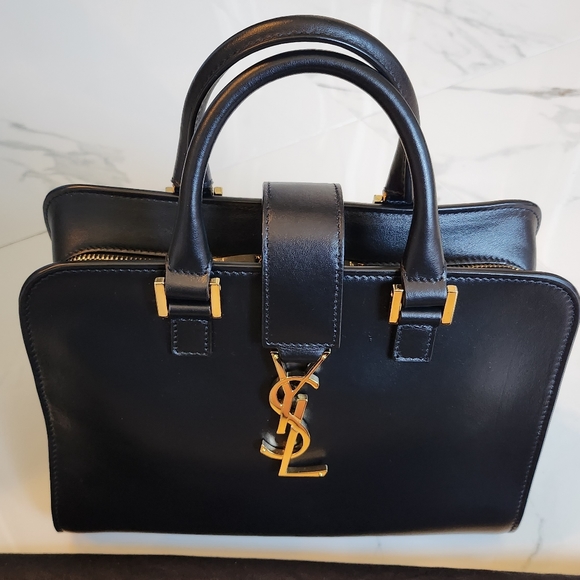 Yves Saint Laurent Handbags - ❤️‼️SALE‼️❤️Gorgeous Authentic Saint Laurent YSL Baby Cabas Black Leather Bag